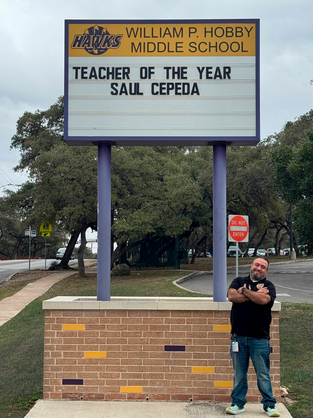 Saul Cepeda standing in front of Hobby Magnet Middle School