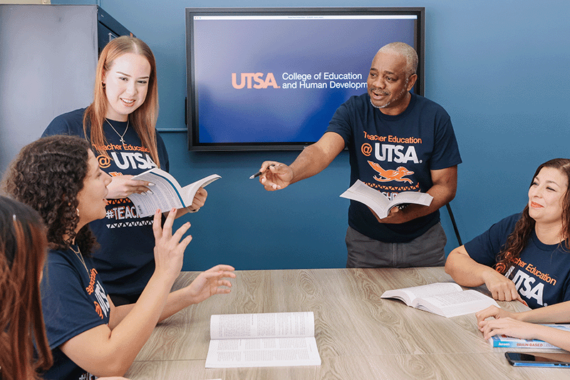 instructors teaching in classroom with students