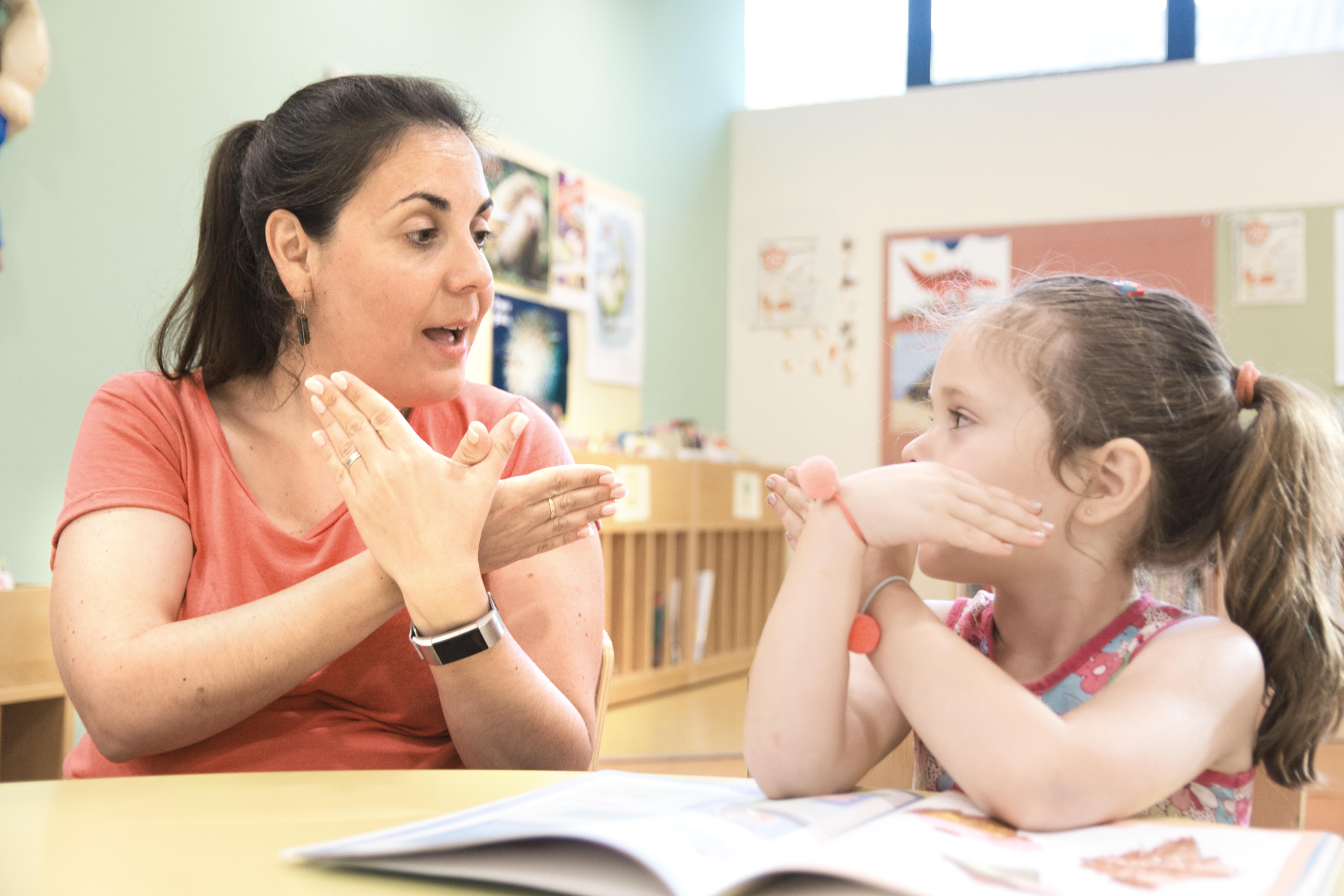 Deaf student learning with teacher