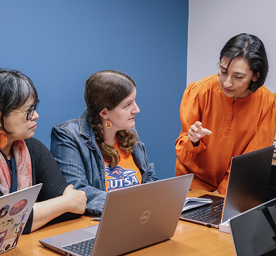 M. Sidury Christiansen, UT San Antonio professor and director and principal investigator for the ADLLE Community Lab, with students.