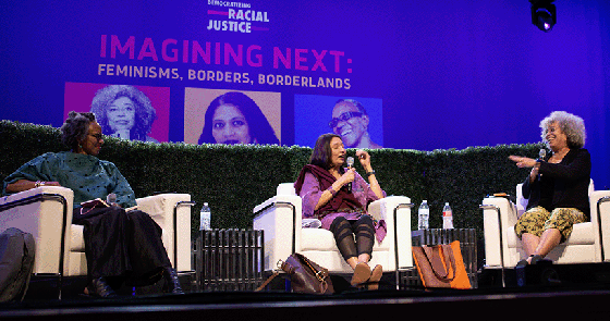 A discussion panel at a Democratizing Racial Justice event