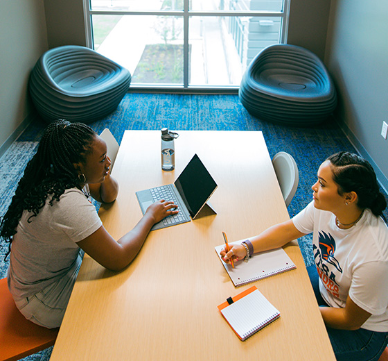 Students working together at a table.