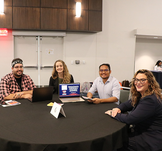 Team of researchers presenting their work at the 16th Annual Research Colloquium.