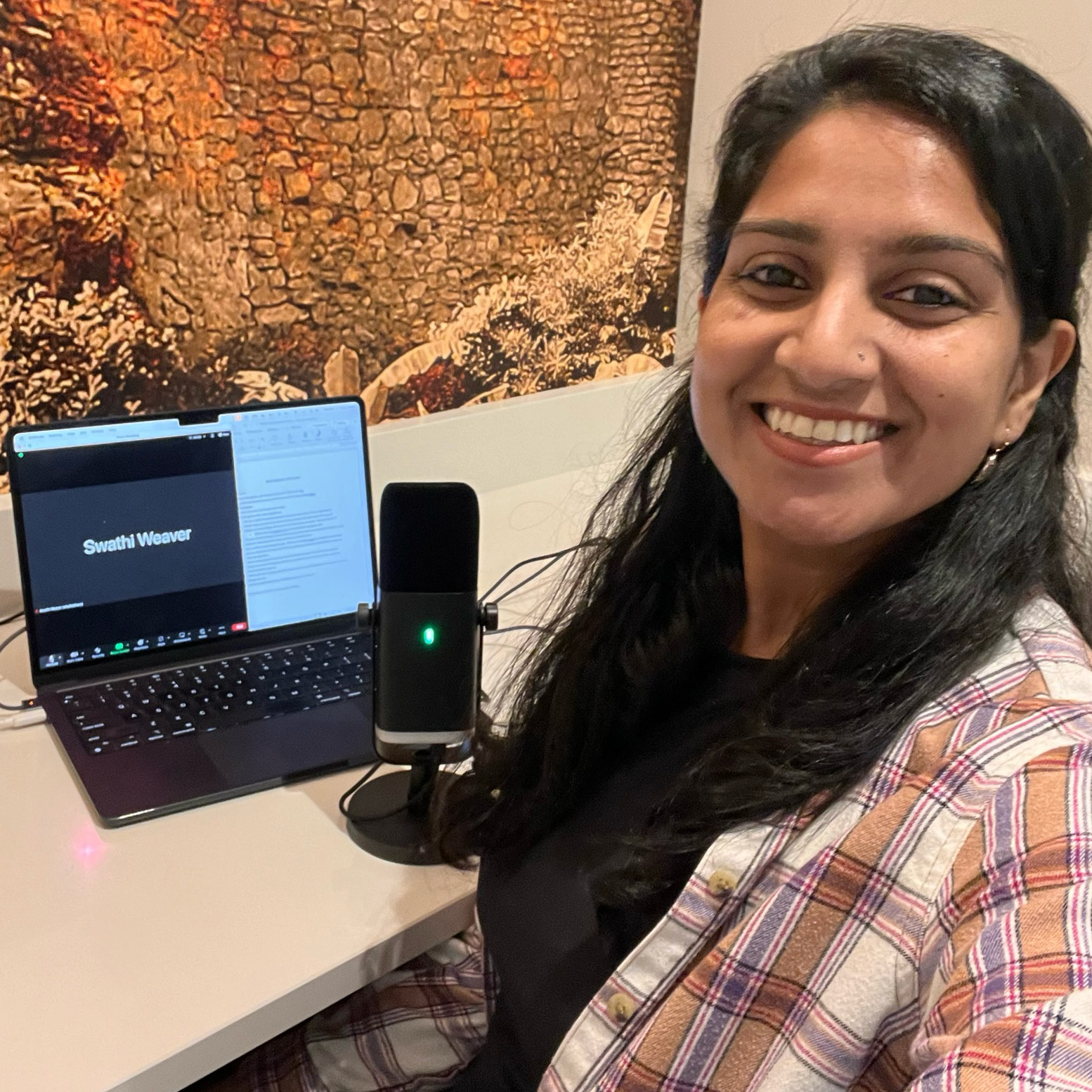 Swathi Weaver recording an episode of her podcast, "Dosas and Mimosas”.